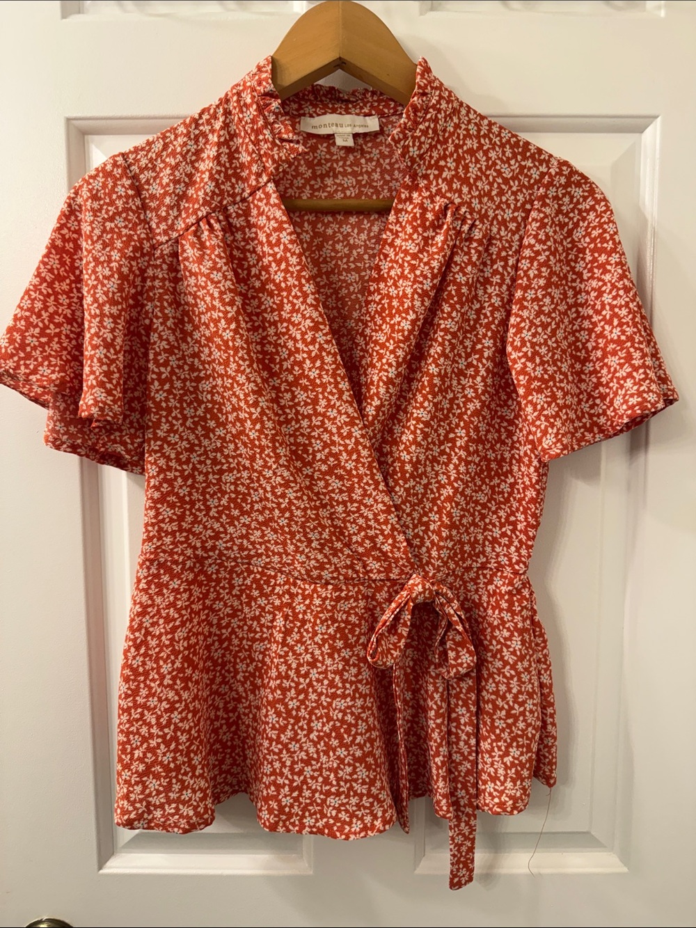 Monteau Orange Floral Wrap Peplum Top